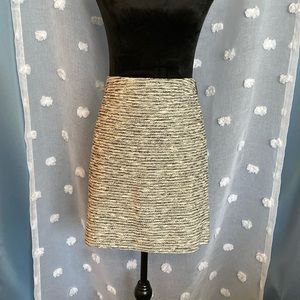 Size 8 tweed skirt. Black and white with silver sparkle details.